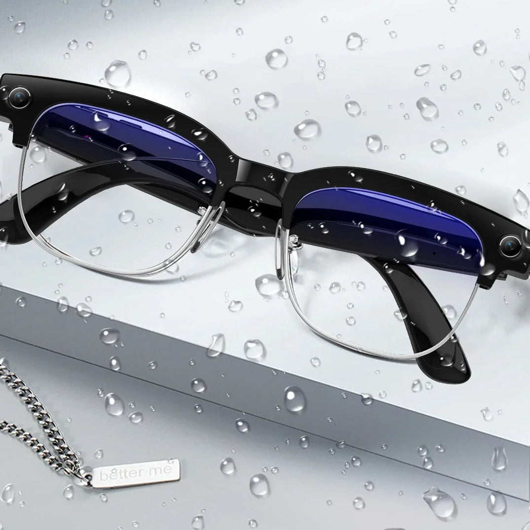 Eyeglasses with water droplets on a gray background, emphasizing dust and water resistance.